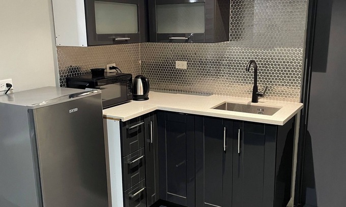 Downtown Apartamento | Tranquility Hotel Suite RB, walking distance to the QPS, Ariapita Ave, & EV Zoo,
