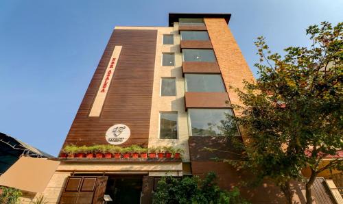 Agara Hotel | Treebo 12 Degrees West, Domlur
