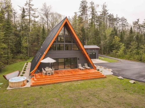 Indian River Casa | TreeTops Ayframe, Supersized AFrame on the River with Hot Tub