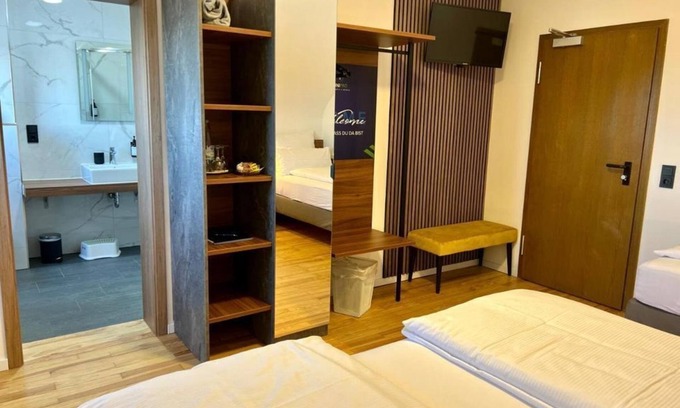 Weiskirchen Apartamento | Triple room - JUNIPRO Hotel Schinderhannes