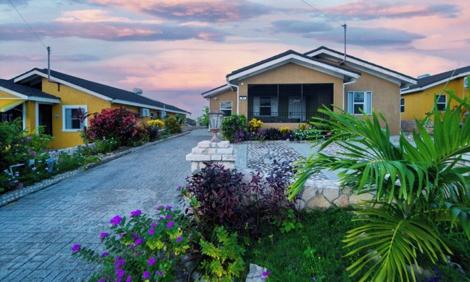 Falmouth Casa | Tropical Escape, Spacious 2 Bedroom Vacation Oasis with WiFi, AC