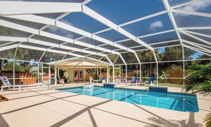 Vero Beach Casa | 🍹🌞 Tropical Getaway! Heated Pool, Tiki Bar, Pirate Sandbox, and Boat Parking!