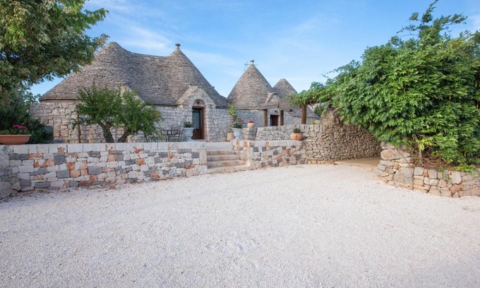 Coreggia Casa | Trullo Siamese