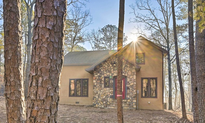 Broken Bow Cabaña | Tudor-Style Broken Bow Cottage w/ Hot Tub & Decks!