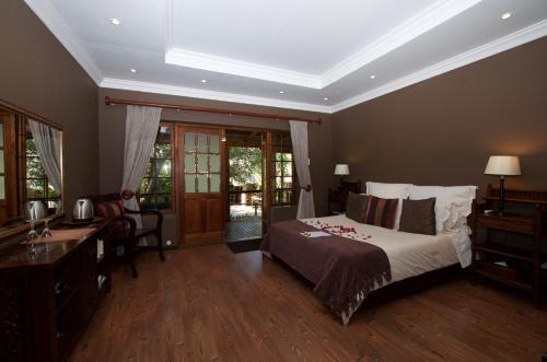 Hartbeespoort Cama Y Desayuno | Tuskers Bush Lodge B&B