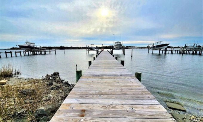 Cedar Point Casa | Two Waterfront homes with two private docks, two hot tubs, Seven bedrooms and 4 bathrooms with boat lift.