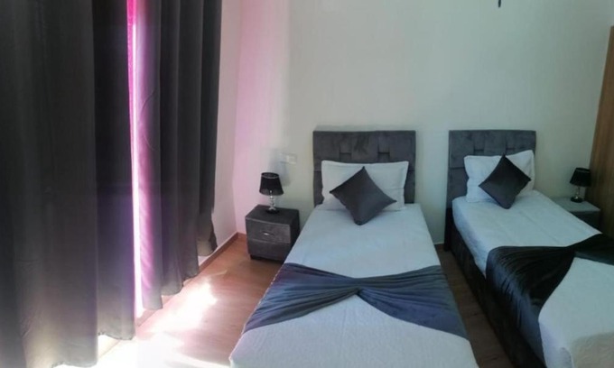 Agdal Apartamento | Un élégant appartement meublé à louer à Marrakech avec deux piscines et une vue magnifique