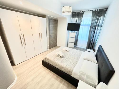 Quartiere XX Ardeatino Casa | Un Letto Ideale EUR