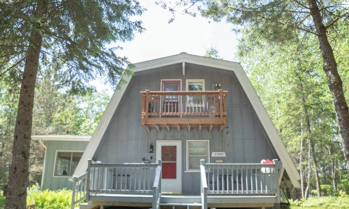 Bigfork Cabina | Unique modified A-frame cabin with loft, sandy lakefront, and amenities of home.