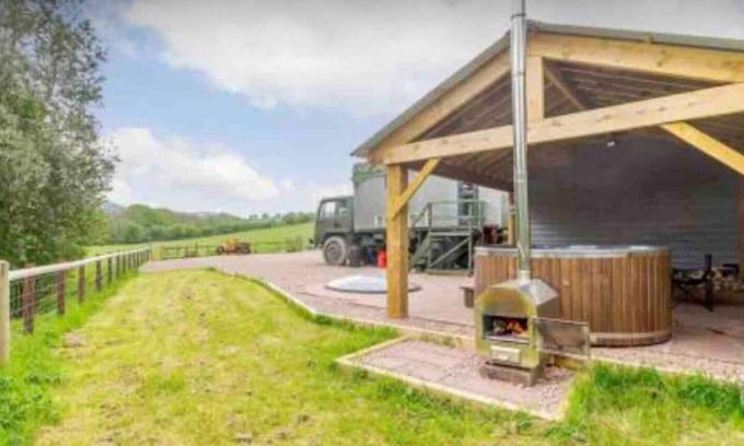 Usk Casa | Unique stay in your very own army truck. Sleeps 4. Hot tub. Tranquil setting.