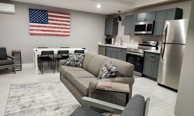 Mancelona Condominio | Unpack and relax with a Mountain view. New! Sleeps 6 Pools, New construction.