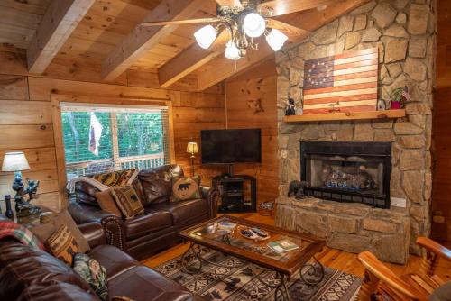 Fleetwood Casa | Updated Cabin with 2 primary suites, hot tub, spacious covered porch