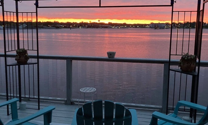 Ludington Casa | Upper level rental with large family room and huge wrap around deck full kitchen