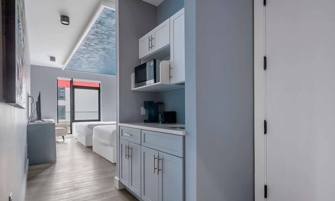 Mott Haven Casa | Upscale Double Queen Suite | Mott Haven | Fitness Center | Free WiFi