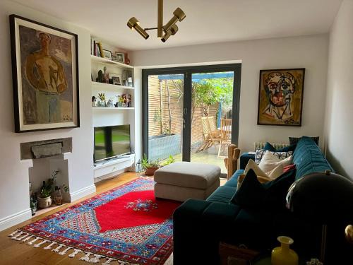 Clissold Apartamento | Urban Oasis Chic 1BR Flat with Spacious Garden