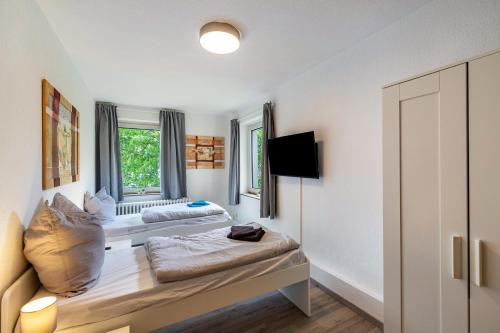 Blumenviertel Apartamento | Urbanes Nest, ideal für Entdecker