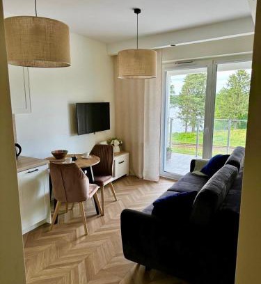 Augustow Apartamento | Urokliwy Apartament z dużym tarasem i widokiem na Jezioro Białe