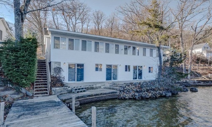 Alton Bay Casa | Vacanza Sleeps 12 with 3 individual units and 3 Docks steps from the Lake