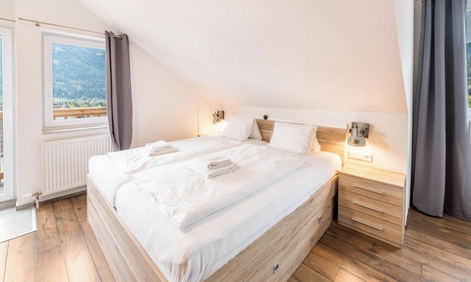 Sankt Martin Apartamento | Apartamento de vacaciones "Mentenwirt Suite" con vistas a la montaña, Wi-Fi y terraza