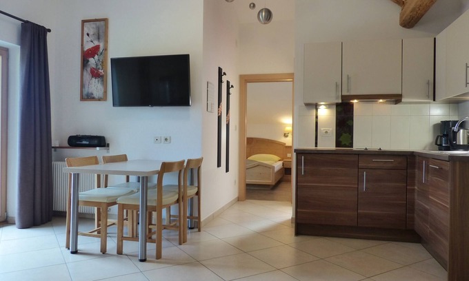 Caines Apartamento | Vacation apartment with large panoramic balcony and organic natural bathing pond
