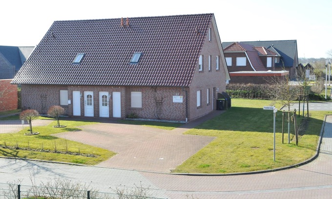 Norddeich Apartamento | Apartamento en planta baja cerca de la playa con wifi y silla de playa