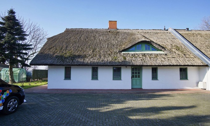 Wiek Apartamento | Vacation apartment close to the beach with sea view - Ferienhaus Strandlatscher FeWo 01