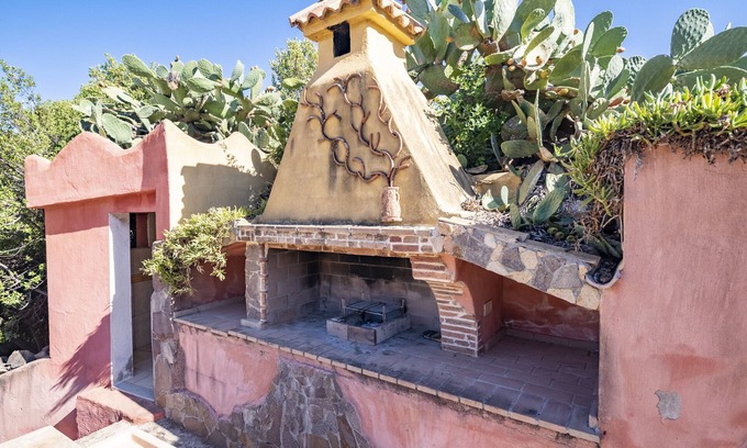 Tertenia Casa | "Appartamento Sole 1" con vistas al mar, jardín y aire acondicionado; mascotas permitidas