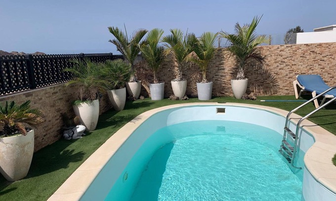 Geafond Casa | Casa Vacacional 'Corralejo Branded Residensed' con Vista al Mar, Wi-Fi y Aire Acondicionado