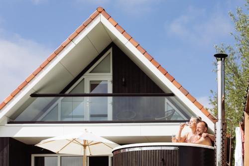 Oostrum Casa | Vakantiehuis aan het water met hottub