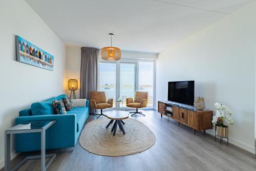 Sint-Annaland Apartamento | Vakantiewoning aan het strand - tuin en terras met haven- & zeezicht - Vista Maris - Nr 14