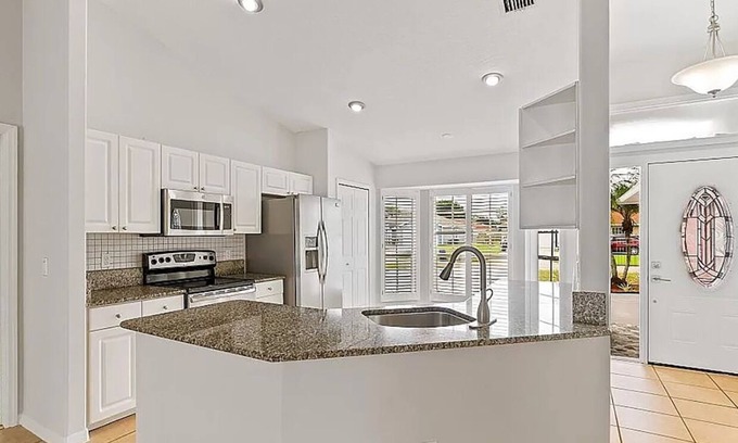 Florida Ridge Casa | Vero Beach.Highland House A Private Spacious 4 bedroom Home with Pool