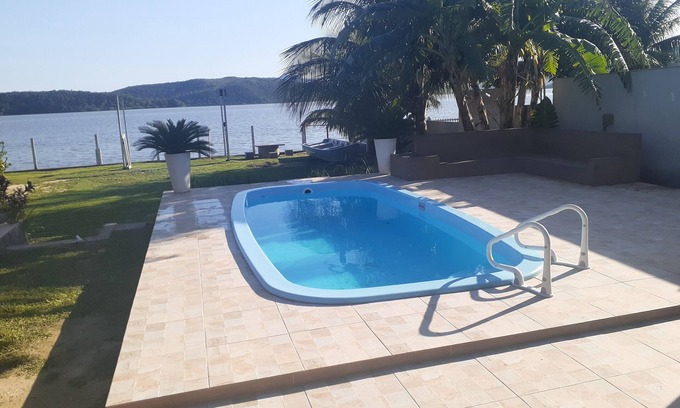Saquarema Casa | Casa muy cómoda con hermosa vista a la laguna.