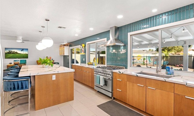 Village Grove Casa | Vibrant Updated MidCentury Home in OldTown-Htd Pool, Firepit, EV+ Garage, Office