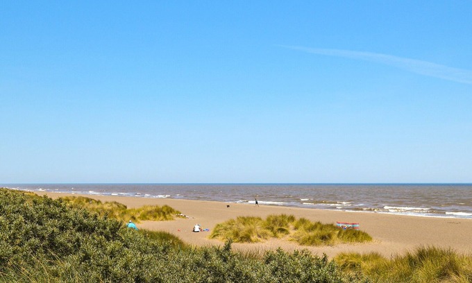 Anderby Creek Cabaña | Views inland across the fields and only 100 yards to the unspoilt sandy beach at Anderby Creek.