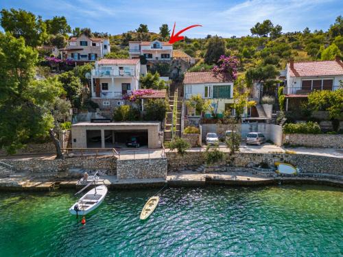 Cove Makarac (Milna) Apartamento | Vila Tudor