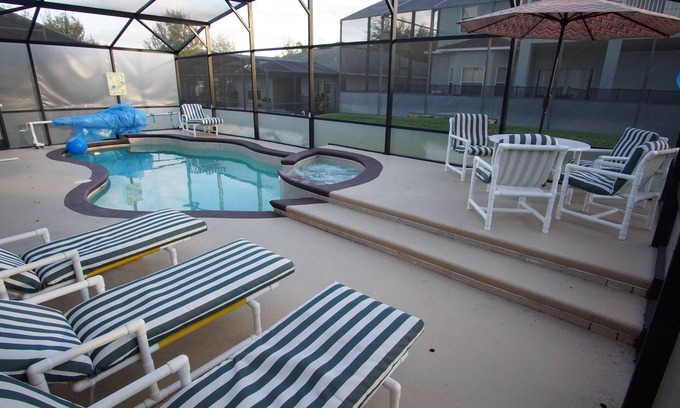 West Haven Villa | Villa a 15 minutos de Disney: sala de juegos, piscina climatizada y spa, piscina climatizada incluida.