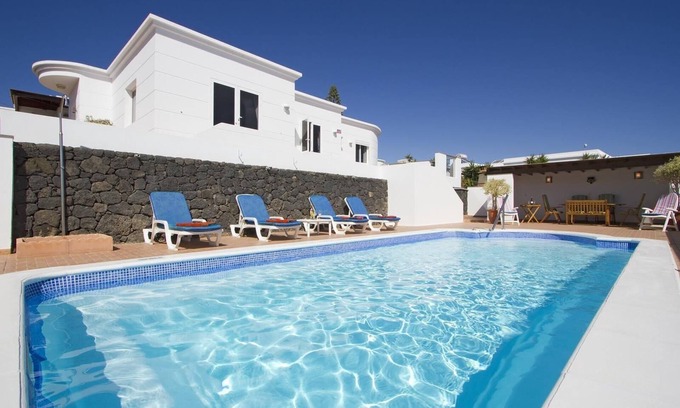 Tias Villa | Villa "Casa McElroy" con vistas al mar y a la montaña, piscina privada, aire acondicionado y WiFi