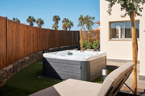 Complejo turístico Amarilla Golf Chalet De Esquí | Villa costera, mar, golf y muelle deportivo