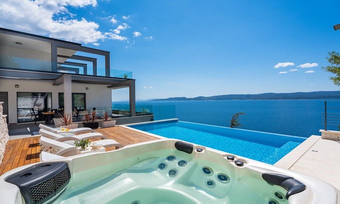 Mimice Villa | ¡NUEVO! VILLA HRID Lujosa villa frente al mar, jacuzzi, piscina infinita con masaje