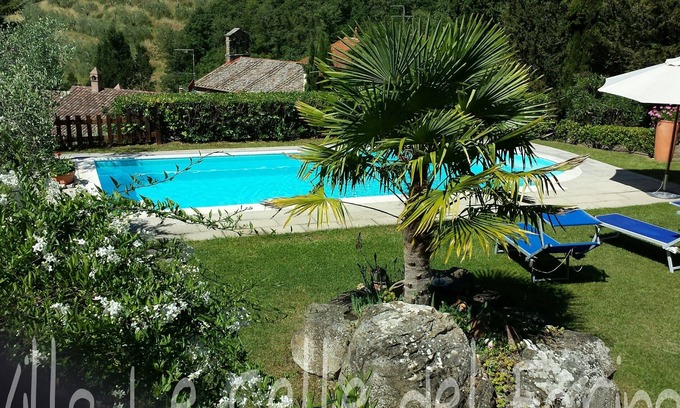 Ferretto Villa | Villa en una zona montañosa rodeada de vegetación con piscina y vistas impresionantes.