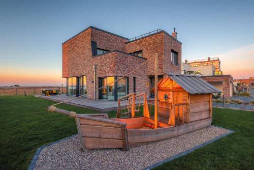 Olpenitz Casa | Villa King Erste Lage, Dachterrasse, Meerblick, Carport, Kamin, Sauna, Terrasse, Aussenrolllaeden