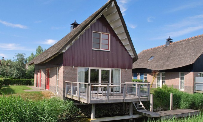 Makkum Villa | Chalet sobre el agua con sauna en Frisia