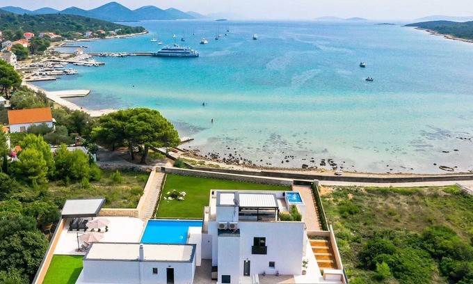 Ist Villa | Villa Seabreeze Haven - villa junto al mar con pista de tenis, piscina de 120 m2, jacuzzi y tranquilidad