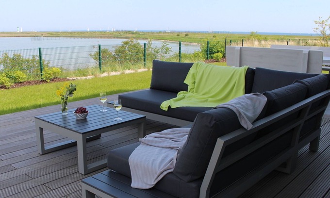 Olpenitzdorf Casa | Villa Seemööv - 1st row on the water, terrace, balcony, whirlpool, sauna, fireplace