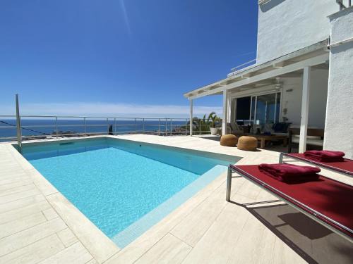 Sitges Villa | Villa Sitges Altavista Amazing View South oriented Calm Area AC Beach 2 minutes Drive and 18 minutes Walk