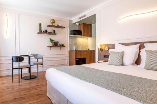 Quartier de Rochechouart Apartamento | Villa SoPi Appart'Hotel by Patrick Hayat
