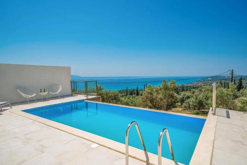 Mousata Villa | Villa Straw Cottage by Villa Plus