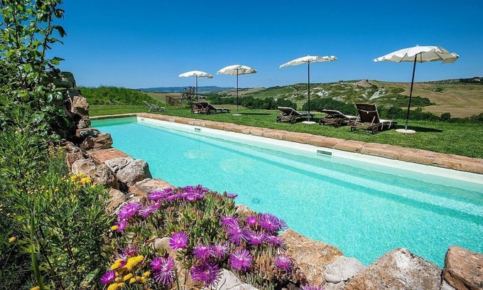 Pienza Villa | Villa Suriana, fully refundable with voucher*: A charming two-story age-old farm house surrounded by meadows and by green hills, with Free WI-FI.