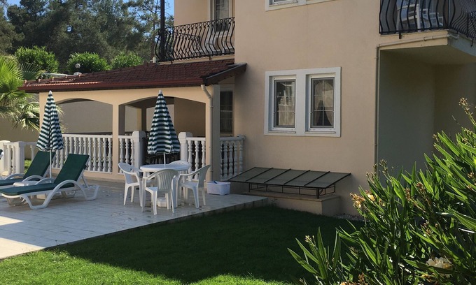 Hisaronu Villa | Villa con piscina privada, terraza, jardín y zona de juegos cubiertos.
