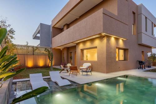 Tassoultante Villa | Villa Yas, Heated Pool, 15min from City Center, 4 Bedrooms, Private Cook and Airport Pickup